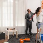couple-painting-room-with-orange-color-paint-2025-02-17-08-26-01-utc-1.jpg